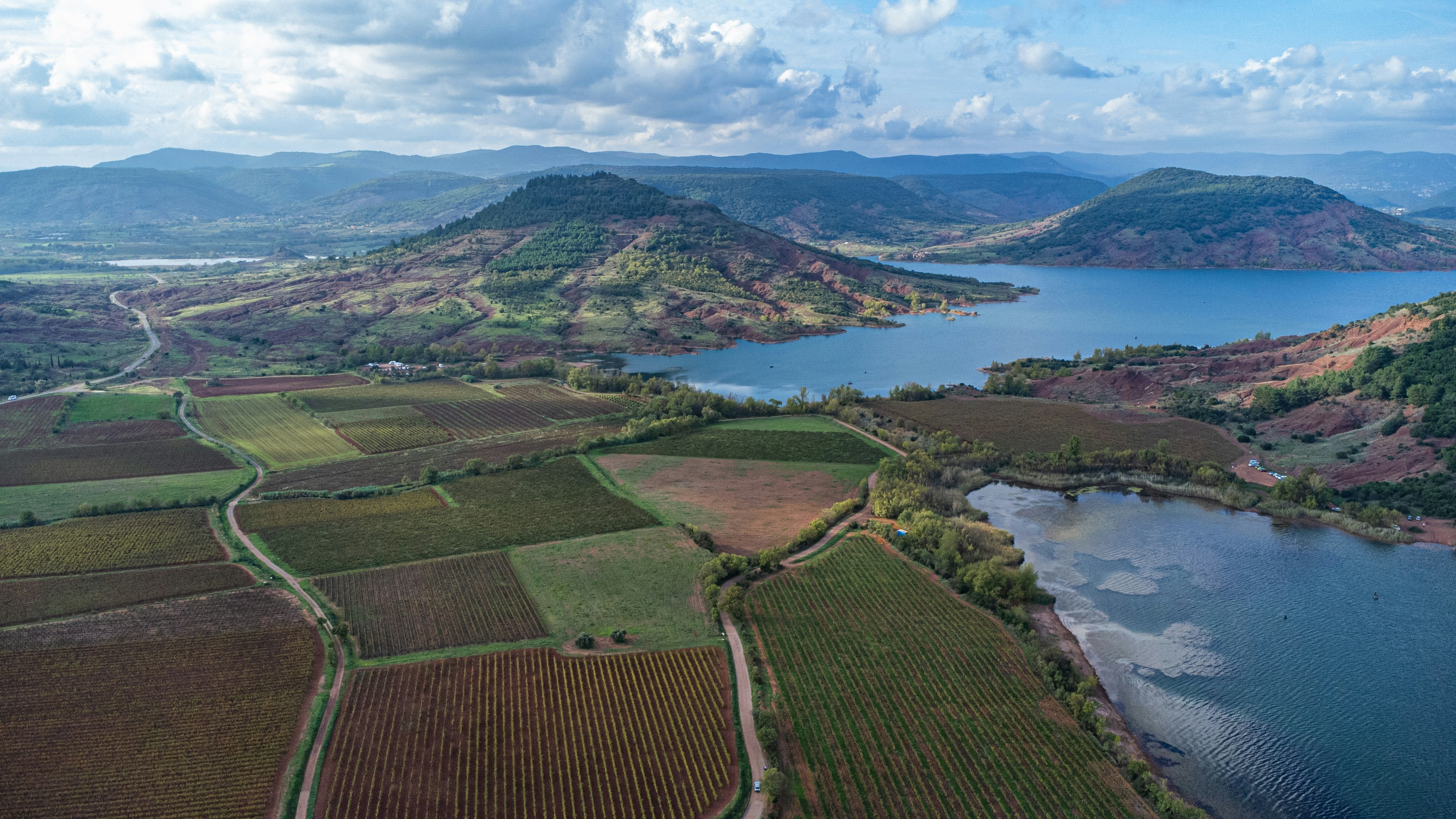 Aerial view of the Salagou lake and its surrounding fields, France