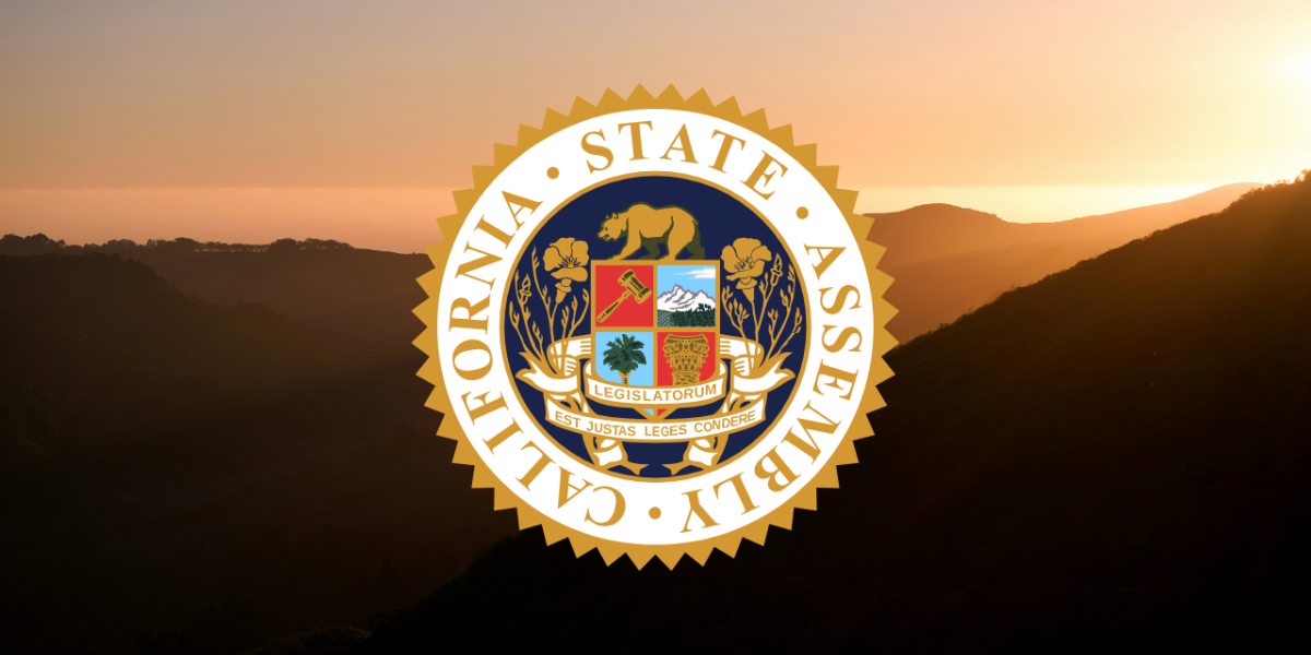 California state assembly photo overlaid sunset