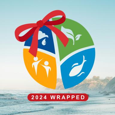 emLab logo with a bow and text that says "2024 wrapped" overlayed over a photo of Santa Barbara's coastline.