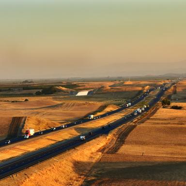 Cars and trucks on a split highway in central California